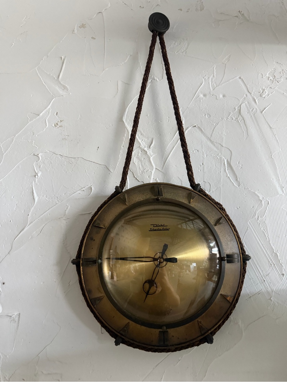 vintage mid-century Diehl brass hanging wall clock featuring a distinctive braid